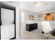 Convenient laundry area with a stacked washer and dryer at 2837 Vallejo St # 108, Denver, CO 80211