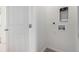 Bright laundry area featuring connections for your washer and dryer and white door at 5783 N Jericho Way, Aurora, CO 80019