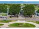 Aerial view of Reunion Coffee House and neighborhood lake at 10559 Sedalia St, Commerce City, CO 80022