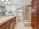 Bathroom featuring a walk-in shower and natural light at 6490 S Pontiac Ct, Centennial, CO 80111
