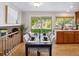 The dining room features hardwood floors and a sliding glass door with backyard views at 6490 S Pontiac Ct, Centennial, CO 80111