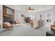 Living room with fireplace, large windows, and seating at 1143 Autumn Star Pt, Monument, CO 80132