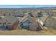 Overhead view of the home, showcasing the backyard patio, landscaping, and surrounding neighborhood at 12957 W 78Th Cir, Arvada, CO 80005