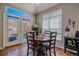 Charming dining area with natural light and views of the outdoors at 12957 W 78Th Cir, Arvada, CO 80005