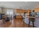 Modern kitchen featuring stainless steel appliances, granite countertops, and ample cabinet space at 12957 W 78Th Cir, Arvada, CO 80005