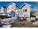 Gray house exterior with backyard and white fence at 11037 Pheasant Ct, Parker, CO 80134