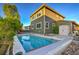 The backyard includes a pristine pool and an attached deck, perfect for relaxation and recreation at 2587 S Flanders Ct, Aurora, CO 80013