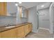 Bathroom features double vanity, framed mirrors, and glass enclosed shower at 2587 S Flanders Ct, Aurora, CO 80013