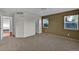 Main bedroom features carpet floors, ceiling fan and natural light at 2587 S Flanders Ct, Aurora, CO 80013