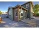 The home features an attached deck with outdoor access from multiple points in the back of the house at 2587 S Flanders Ct, Aurora, CO 80013