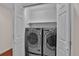 Convenient laundry room with front loading washer and dryer at 2587 S Flanders Ct, Aurora, CO 80013