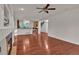 Spacious living room with fireplace and hardwood floors at 2587 S Flanders Ct, Aurora, CO 80013