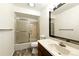 Clean bathroom with tub/shower combination and ample counter space at 6376 Lamar Pl, Arvada, CO 80003