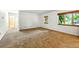 Cozy bedroom with wall to wall carpet, natural light, and ensuite bathroom at 6376 Lamar Pl, Arvada, CO 80003