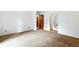 Spacious carpeted bedroom with neutral walls, large window and plenty of natural light at 6376 Lamar Pl, Arvada, CO 80003