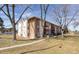 Attractive exterior view of a multi-unit building, showcasing well-maintained landscaping and inviting curb appeal at 12114 Melody Dr # 303, Denver, CO 80234