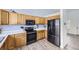 Kitchen featuring stainless steel appliances, ample counter space, modern cabinetry, and updated flooring at 3734 Licorice Trl, Castle Rock, CO 80109