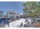 View of two-story home and backyard in winter at 2959 Skyward Way, Castle Rock, CO 80109