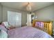 Bedroom with double bed, crib, and closet at 2959 Skyward Way, Castle Rock, CO 80109