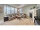 Living room with sectional sofa and fireplace at 2959 Skyward Way, Castle Rock, CO 80109