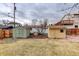 Spacious backyard with two sheds and a patio area at 4324 Eaton St, Denver, CO 80212