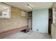 Unfinished basement with storage shelving and access to outside at 4324 Eaton St, Denver, CO 80212