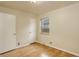 Well-lit bedroom with hardwood floors and window at 4324 Eaton St, Denver, CO 80212