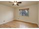 Bright bedroom with hardwood floors and a large window at 4324 Eaton St, Denver, CO 80212