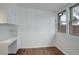 Sunroom with windows and built-in cabinets and desk at 4324 Eaton St, Denver, CO 80212