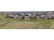 Enjoy this scenic aerial view of this neighborhood and homes in a green, open area at 5049 Heatherglen Dr, Highlands Ranch, CO 80130