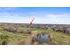 Property features a pond, path, and green space in the neighborhood at 5049 Heatherglen Dr, Highlands Ranch, CO 80130