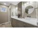 Modern bathroom with double vanity, granite countertops, and contemporary fixtures at 5049 Heatherglen Dr, Highlands Ranch, CO 80130