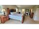 Cozy main bedroom featuring a comfortable bed, bright windows, and ample closet space at 5049 Heatherglen Dr, Highlands Ranch, CO 80130