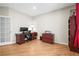 Comfortable home office with a desk, chair, and ample storage space at 5049 Heatherglen Dr, Highlands Ranch, CO 80130
