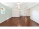 Finished basement with hardwood floors, recessed lighting, and built in shelves at 6891 W Eldorado Pl, Lakewood, CO 80227