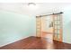 Bedroom showcasing sliding glass doors leading to a secondary room, perfect for an office or guest room at 6891 W Eldorado Pl, Lakewood, CO 80227