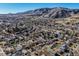 Residential neighborhood with lush tree coverage and mountain views in the distance at 709 2Nd St, Golden, CO 80403