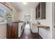 Laundry room with washer and dryer and a wooden countertop at 709 2Nd St, Golden, CO 80403