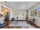 Bright living room with a white sofa and a large window at 709 2Nd St, Golden, CO 80403