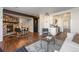 Open living space with hardwood floors connecting the dining and kitchen areas at 709 2Nd St, Golden, CO 80403