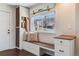 Mudroom with a storage and bench seating near the front door at 709 2Nd St, Golden, CO 80403