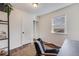 Office space with a desk, chair, shelving, and bright window at 709 2Nd St, Golden, CO 80403