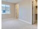 Bright bedroom with a closet and neutral carpeting at 1765 Peak Loop, Broomfield, CO 80023