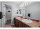 Double vanity bathroom with access to a separate tub at 4067 S Odessa St, Aurora, CO 80013