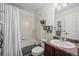 Clean bathroom with tub shower combo and updated vanity at 4067 S Odessa St, Aurora, CO 80013