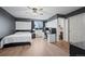 Spacious bedroom with built-in workspace and wood-look floors at 4067 S Odessa St, Aurora, CO 80013