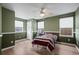 Bright bedroom with two windows and ceiling fan at 4067 S Odessa St, Aurora, CO 80013