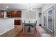 Dining room with grey chairs and access to backyard at 4067 S Odessa St, Aurora, CO 80013