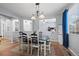 Dining area with dark wood table and blue chairs at 4067 S Odessa St, Aurora, CO 80013