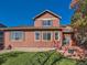 Two-story house with backyard patio and landscaping at 4067 S Odessa St, Aurora, CO 80013